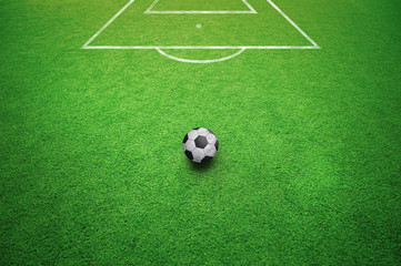 Conceptual football free kick soccer ball background. Soccer ball on sunny soccer field ground. 