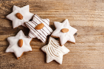 Gingerbread cookies in star shape decorated with almonds on brow