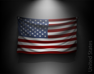 waving flag United States on a dark wall