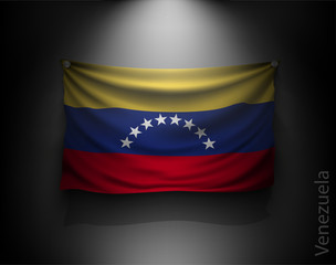 waving flag venezuela  on a dark wall