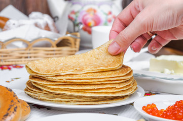 Pancakes and red caviar