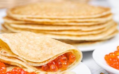 Pancakes and red caviar