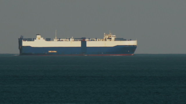 Car Transport Ship Passing By in South Florida Logos Removed