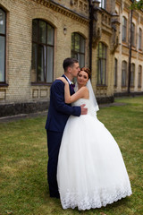 Happy bride and groom at the wedding walk