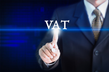 Businessman holding a white sign with the message VAT. Can be used for your advertising.