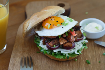 Closeup of a grilled chicken burger with teriyaki