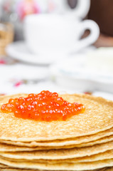 Pancakes and red caviar