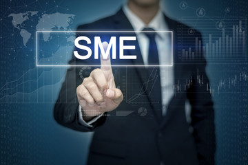 Businessman hand touching SME  button on virtual screen