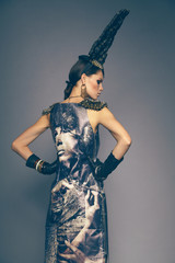 Woman in headwear with spikes