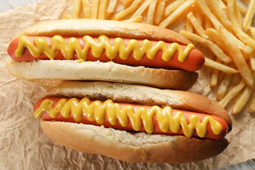 Hot dogs and fried potatoes closeup