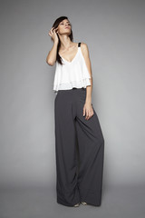 Woman posing shirt and wide-leg pants