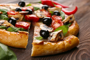 Sliced delicious tasty pizza, closeup