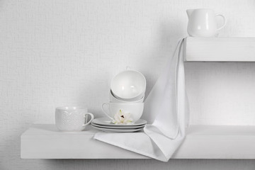 Tableware with napkin on a white background