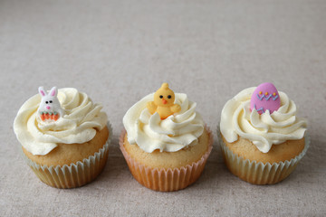 Homemade Easter cupcakes,copy space background