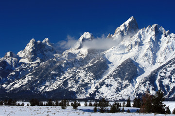 Grand Teton Peaks in Wyoming USA. The peaks / summits in the picture left to right are: South Teton...