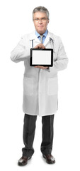 A handsome doctor with stethoscope and tablet, isolated on white
