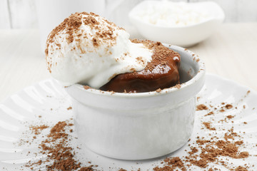 Chocolate lava cake with ice-cream on the table