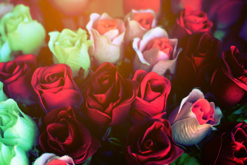 Fototapeta na wymiar Fake roses.Process in vintage color tone