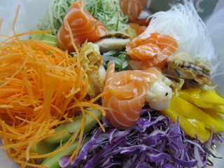 "Yusheng", "yee sang" or "yuu sahng" is a special raw fish salad dish in Chinese New Year
