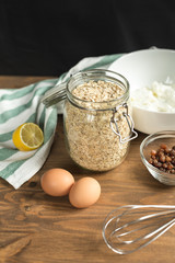 Ingredients for cheese casseroles, oatmeal, cottage cheese, eggs