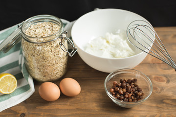 Ingredients for cheese casseroles, oatmeal, cottage cheese, eggs