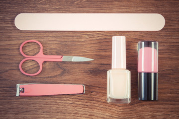 Naklejka premium Vintage photo, Cosmetics and accessories for manicure or pedicure, concept of nail care