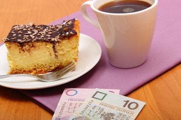 Paying for cheesecake and coffee in the cafe, finance concept