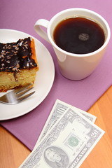 Paying for cheesecake and coffee in the cafe, finance concept