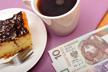 Paying for cheesecake and coffee in the cafe, finance concept
