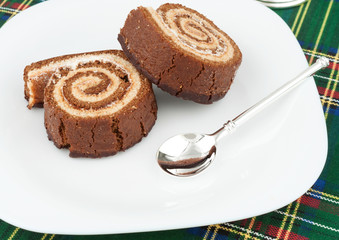 Four chocolate cake roll closeup