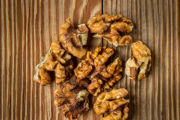 Shelled walnuts on rustic  table
