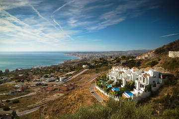 Obraz premium White Houses On The Mountainside