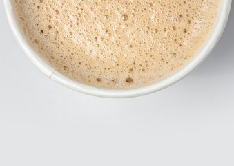top view of paper cup mix latte coffee foam, Close up, white bac