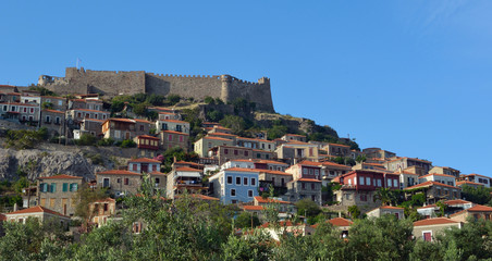  The popular holiday village of Molyvos village hillside and fort.