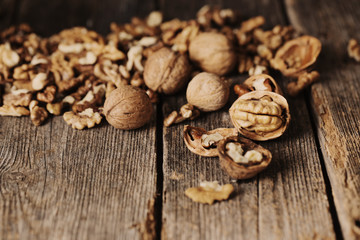 walnuts on rustic old wooden table
