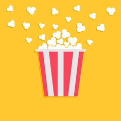 Popcorn popping. Red yellow strip box. Cinema movie night icon in flat design style.