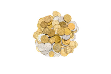 Heap of coins isolated on white