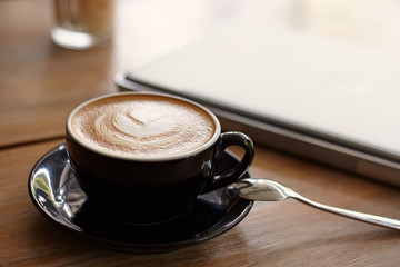 Hot cappuccino on the table