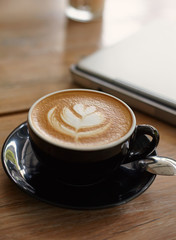 Hot cappuccino on the table