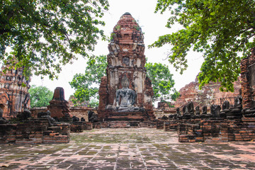 Tourist travel to visit ancient pagoda at Wat Mahathat temple, Ayutthaya, Thailand - obrazy, fototapety, plakaty