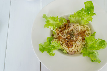 Classic Pasta carbonara Italian or spaghetti on white wood table