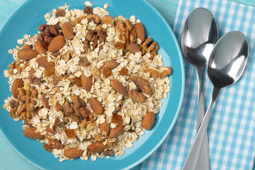 Oatmeal flakes with nuts in plate