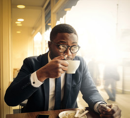 Man drinking a cappuccino