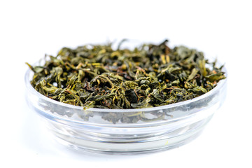 closeup of Bao Zhong Oolong Tea isolated on white background