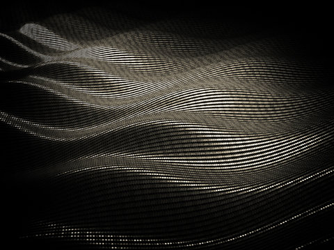  carbon fiber textured background, wave geometry. concept of resistende and technological material. nobody around.