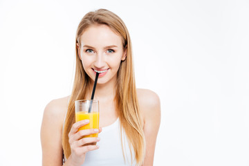 Happy woman holding fresh juice