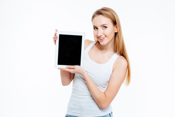 Smiling woman showing blank tablet computer screen