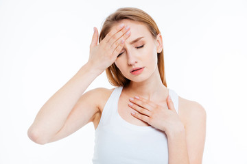 Fototapeta premium Sick woman touching her head