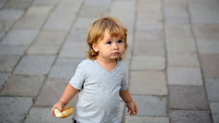 Portrait of blond hazel-eyed kid