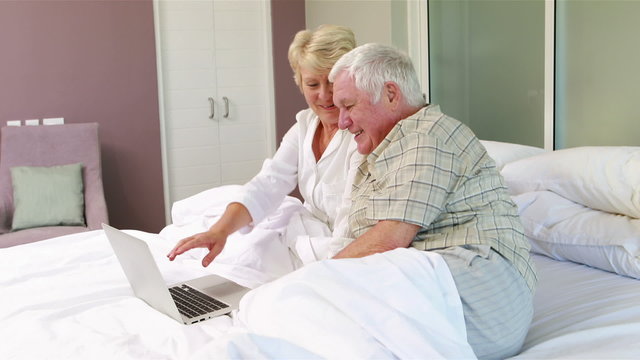 Senior couple doing video chat